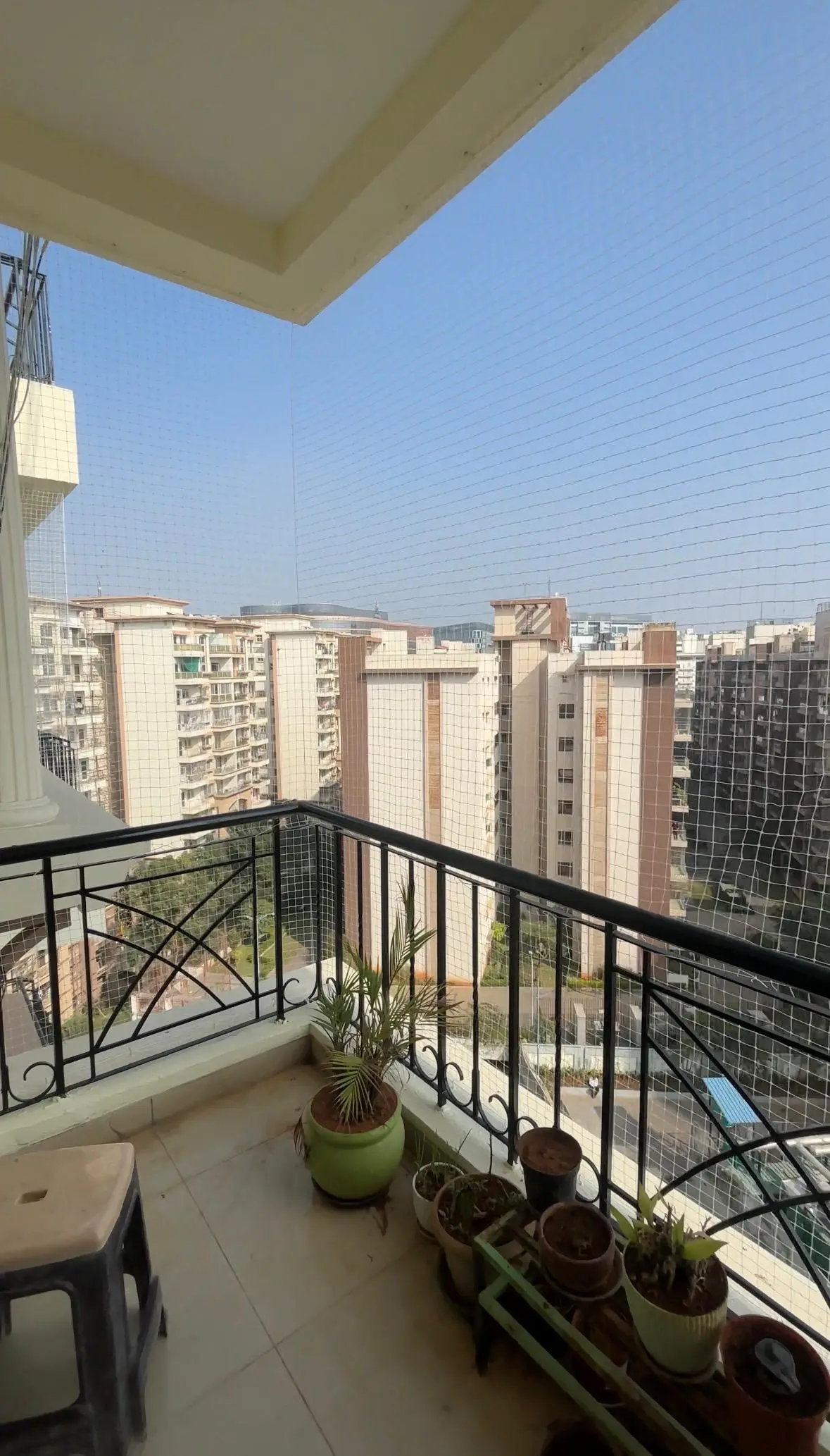 Balcony safety net installation on high-rise apartment in Bangalore