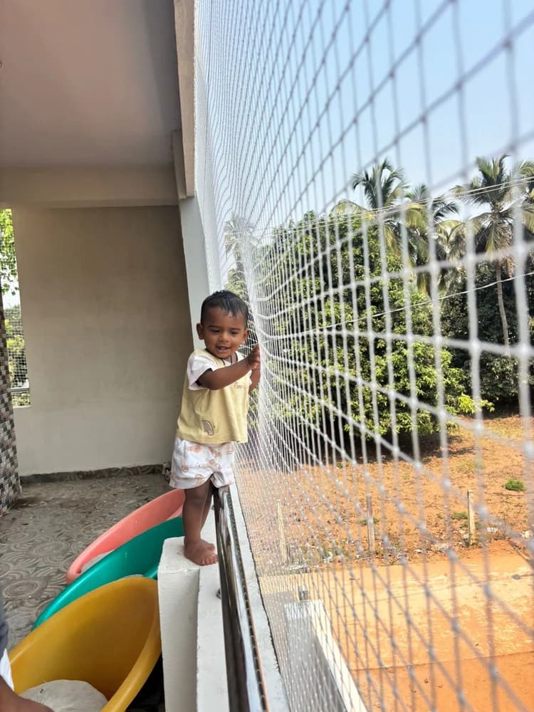 Reinforced child protection netting on staircase and balcony gallery