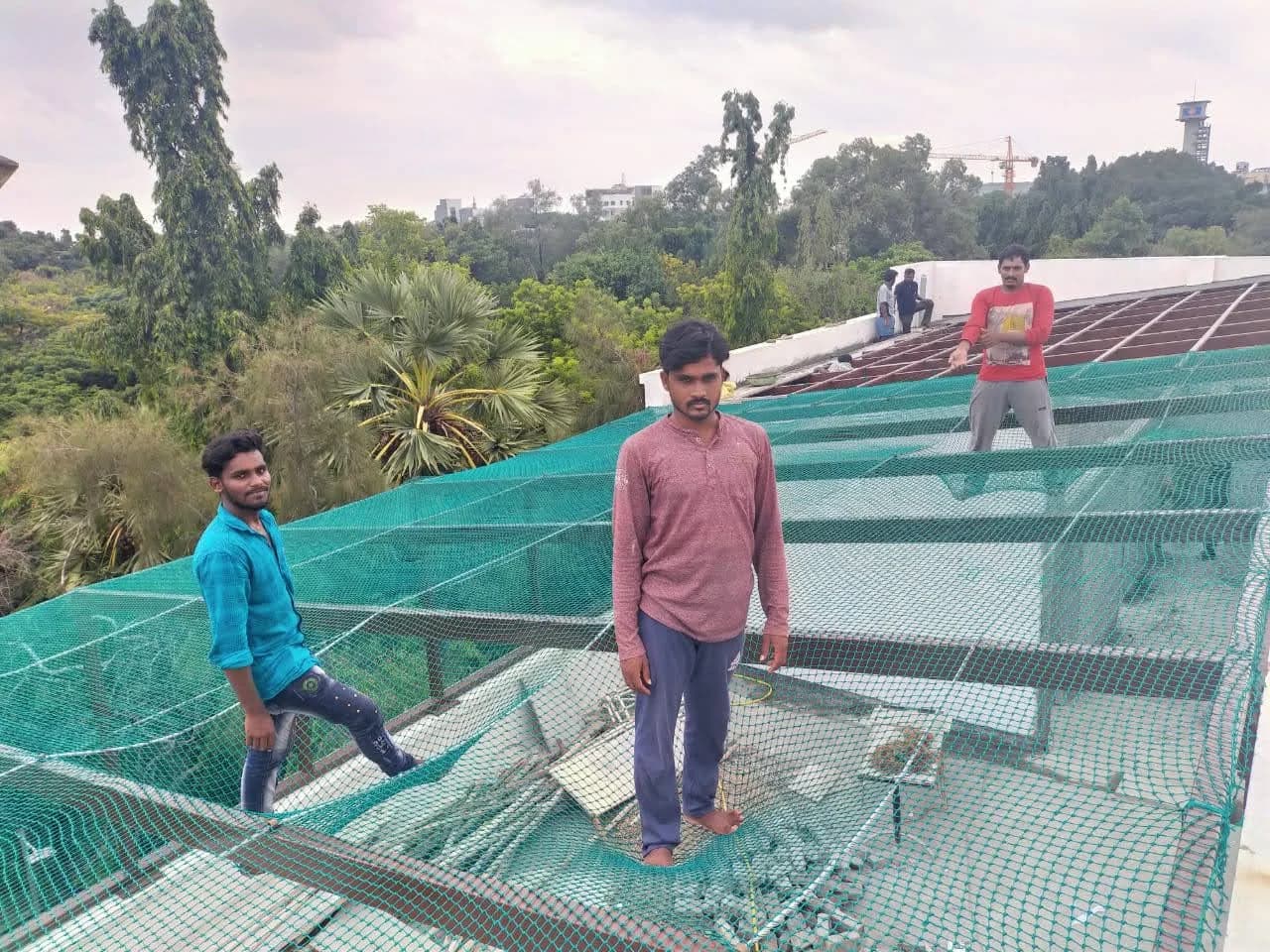 Industrial building safety and debris catchment net fitment by Shrishti Enterprises
